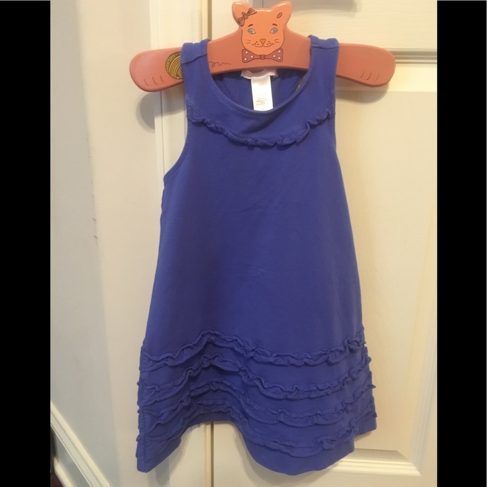 Violet cotton tank dress with ruffle hem.
